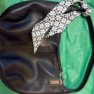 Black Coach handbag with black n white scarf style attachment